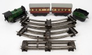 HORNBY (O Gauge) tinplate clockwork train with track.