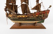 A scratch-built model galleon with hand-painted finish, in shipwreck condition, mid 20th century, 52cm high, 56cm long. - 3