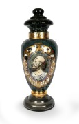 An antique glass apothecary specie jar with reverse painted portrait decoration and green marbled finish, 19th century, 65cm high.