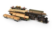 HORNBY (O Gauge) tinplate electric locomotive and tender with assorted lumber wagons.