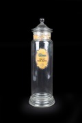 An antique English glass lidded confectionery jar with remains of original paper label "PARKES FRUIT BON-BONS 4D.", 19th/20th century, 55cm high.