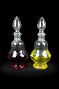 A pair of antique English glass apothecary carboys, 19th century, 48cm high.
