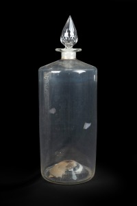 Antique English cylindrical glass apothecary jar with facetted stopper, 19th century, 51cm high.