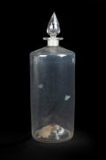Antique English cylindrical glass apothecary jar with facetted stopper, 19th century, 51cm high.