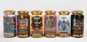 A set of six reproduction coloured glass apothecary jars with pictorial and gilt decoration, 20th century, 33cm high.