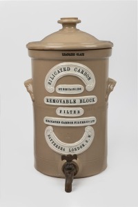 Antique English pottery water filter with applied logo and original Pratt ware filter interior, "SILICATED CARBON, STERILISING FILTER, BATTERSEA, LONDON...", 19th century, 41cm high.