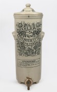 DOULTON'S IMPROVED GERM INTERCEPTING FILTER antique English stoneware water filter with floral decoration, 19th century, 56cm high.