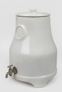 REVIGATOR antique American porcelain water filter with original tap and lid; instructions under lid, circa 1920s, 38cm high.