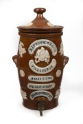 LIPSCOMBE & Co. of Manchester, antique English stoneware water filter with sprig moulded decoration and English coat of arms, 19th century, 45cm high.