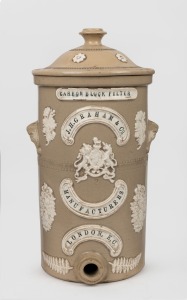 J. H. GRAHAM & Co. MANUFACTURERS, LONDON antique English pottery water filter with sprig moulded floral and fern decoration, 19th century, 49cm high.