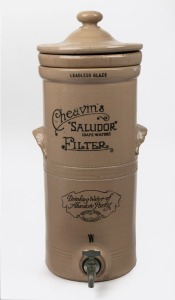 CHEAVIN'S SALUDOR FILTER antique English pottery water filter with original insert and tap, 19th century, 52cm high.
