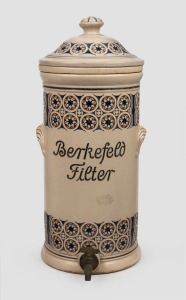 BERKEFELD antique German pottery water filter with coloured decoration, 19th century, 52cm high.