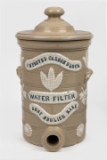 "IMPROVED CARBON BLOCK WATER FILTER, BEST ENGLISH MAKE" antique pottery water filter, attractive small size with original lid, 19th century, ​​​​​​​35cm high.