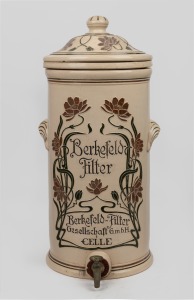 BERKEFELD antique German pottery water filter with Art Nouveau floral decoration, 19th/20th century, 54cm high.