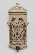 BERKEFELD antique German pottery water filter with Art Nouveau floral decoration, 19th/20th century, 54cm high.