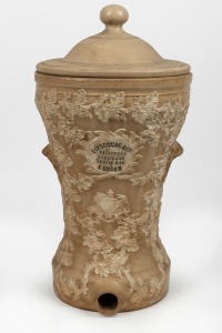 LIPSCOMBE & Co., TEMPLE BAR, LONDON antique English pottery water filter, ornately decorated with sprig moulding and English coat of arms, 19th century, 49cm high.