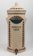 BERKEFELD antique German pottery water filter with rose decoration, early 20th century, 62cm high.