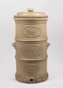G. CHEAVING'S IMPROVED PATENT GOLD MEDAL SELF CLEANING RAPID WATER FILTER antique pottery water filter with badge "F. LASSETTER & Co., NEW SOUTH WALES, SOLE AGENTS", 19th century, 71cm high.