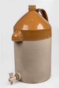A large antique English pottery demijohn, 19th/20th century, 53cm high.