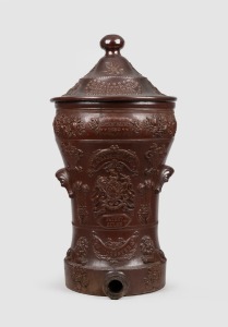 SLACK & BROWNLOW CELEBRATED WATER FILTER, HULME, MANCHESTER attractive antique English stoneware water filter, ornately adorned with sprig moulded lions, floral motif and coat of arms, 19th century, 62cm high.