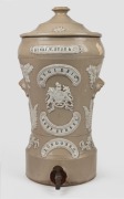 HENRY W. BUSH & Co. HYGIENIC antique English pottery water filter with sprig moulded fern and floral decoration and British coat of arms, 19th century, 55cm high.