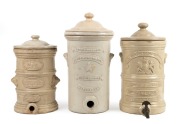 Three antique English stoneware water filters, 19th/20th century, A/F, the largest 45cm high.