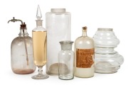 Six assorted glass apothecary jars and bottles, 19th/20th century, ​​​​​​​the largest 45cm high.