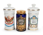 Three reproduction apothecary dispensing jars, 20th century, ​​​​​​​the largest 28cm high.