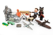 Michelin Bibendum collectables, tin plate toys, celluloid, bakelite etc., mixed vintages, (14 items), the larger Michelin piece 19cm high, 22cm long.