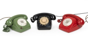 Three vintage coloured plastic telephones, 20th century.