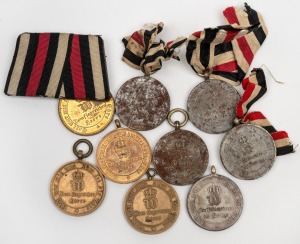 FRANCO-PRUSSIAN WAR MEDALS: 1870-71 bronze medals (4) awarded to Prussian soldiers (3 with rim inscriptions); together with steel medals (5) issued to non-combatants. Mixed condition. (Total: 9).