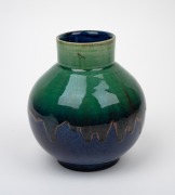 P.P.P. (PREMIER POTTERY, PRESTON) green and blue glazed pottery vase with pink highlights, circular factory mark to base, 16.5cm high. - 2