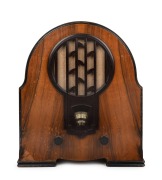 PHILIPS vintage walnut veneered mantle radio with brown bakelite grill, 48.5cm high.