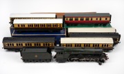 BASSETT-LOWKE "FLYING SCOTSMAN" O gauge tinplate 20 volt locomotive and tender in original box, together with seven assorted passenger carriages, three of which have original boxes.