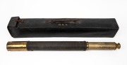 An antique single draw expanding telescope with woven binding, housed in original leather travel case with gilt embossed monogram "H. G. G.", 19th century, 51cm long, expands to 89cm.