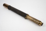 An antique single draw expanding telescope with woven binding, housed in original leather travel case with gilt embossed monogram "H. G. G.", 19th century, 51cm long, expands to 89cm. - 2