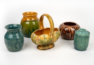 EDNA CURNOW green glazed pottery jar; together with a pottery basket vase and three pottery vases, (5 items), the largest 26cm high.