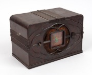 ASTOR MICKEY MOUSE BP brown bakelite Australian mantle radio with pictorial Mickey Mouse glass dial, circa 1937, as is barn find condition, note missing one knob and base plate has been cut with some replacement components. 16cm high. - 2