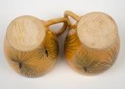 JOHN PERCEVAL & ARTHUR MERRIC BOYD lidded pottery jug on yellow ground, hand-painted with kangaroos and grass trees; together with two coffee cups and three saucers, (6 items), the cups incised "A.M.B. Perceval", the pot incised "Arthur Merric Boyd", the - 3
