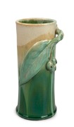 REMUED cylindrical pottery vase with applied gumnuts and leaf in green and cream glaze, 22.5cm high.