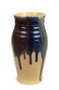 P.P.P. (PREMIER POTTERY, PRESTON) drip glazed yellow pottery vase with pink, green, blue and yellow highlights, stamped twice with the "PPP" circular factory mark, ​​​​​​​22cm high.