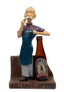 BALLARAT BERTIE vintage hand-painted fired plaster point of sale advertising statue with bottle, 33cm high overall.
