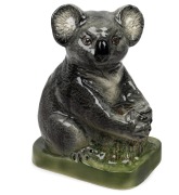 WEMBLEY WARE koala statue, designed by John Tribe (1904-1974), first produced in 1946, impressed factory mark to base "Wembley Ware", ​​​​​​​26cm high.