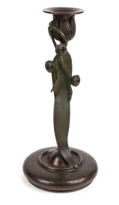 FRED BROSI (American, 1869-1933) for YE OLDE COPPER SHOPPE, American hand-made copper candlestick, adorned with applied gum leaf, branches and gumnuts, circa 1920s, oval stamped mark to base "Hand Wrought by Fred Brosi, Ye Olde Copper Shoppe, San Francisco", 27cm high.