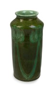 DELTA M. BROWN (HARVEY SCHOOL) green glazed pottery vase with Art Nouveau waratah decoration, incised in triangular cartouche "DELTA", ​​​​​​​20cm high.