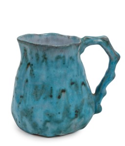 JOLLIFF turquoise glazed pottery jug with mauve interior, incised "Hand Built, Jolliff, 1953", 11.5cm high.