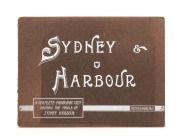 "SYDNEY & HARBOUR, A Complete Panoramic View Showing The Whole Of Sydney Harbour" circa 1900; Oblong in original brown boards with white title to front cover. Photographic black and white view of Sydney and Harbour measuring 260 x 21.5cm folded concertina