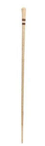 An antique turned whalebone walking stick with baleen spacers and whale tooth handle, unusual dwarf size, 19th century, 64.5cm high.