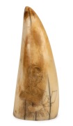 A scrimshaw whale's tooth with female portrait both front and back, ​​​​​​​12.5cm high.