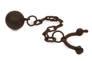 Convict ball and chain in relic condition (half of the ankle cuff missing), 19th century, 75cm long overall.